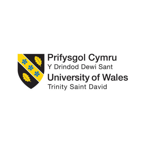 University of Wales Trinity Saint David logo featuring a shield divided into three with 2 yellow leaf symbols on a black background and green starts on a yellow stripe. Text on the right of the right of the shield says 'Prifysgol Cymru Y Drindod Dewi Sant University of Wales Trinity Saint David'