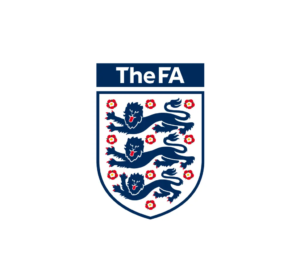 Logo of The FA (The Football Association), featuring a shield with three blue lions and 10 red roses, with the text 'The FA' above the shield in white on a navy blue background.