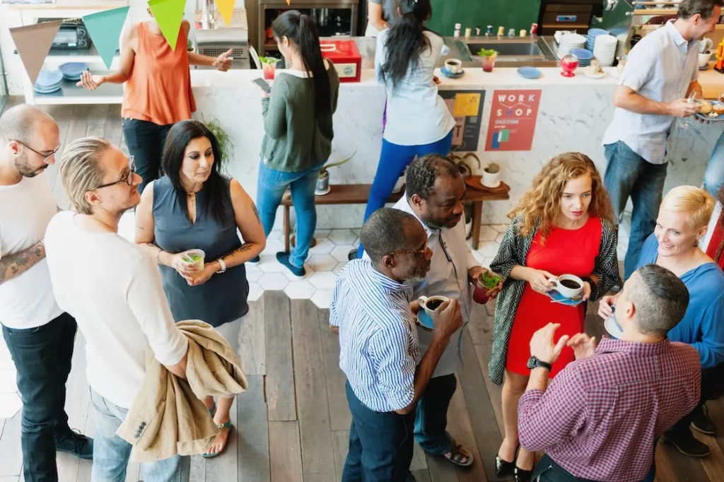 Group of people at event. Represents users of VeryConnect's community management software.