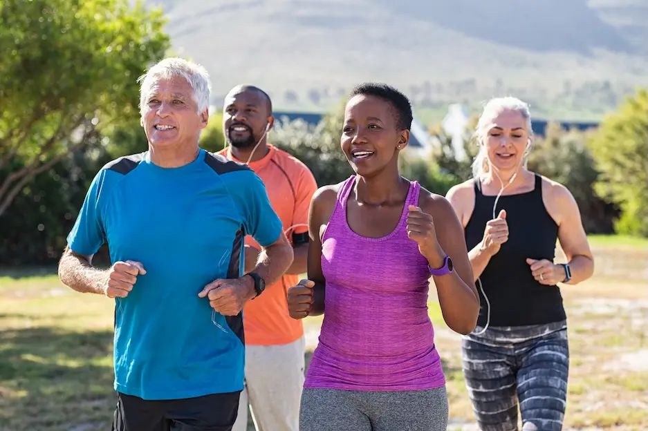 Four people jogging. Represents users of VeryConnect's fitness club membership software.