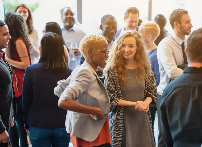 Groups of people in conversation. Represents users of VeryConnect's event management software.